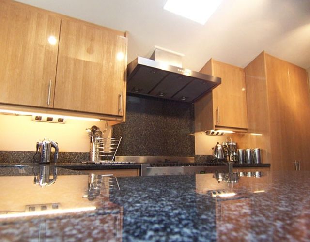 Wood and granite kitchen